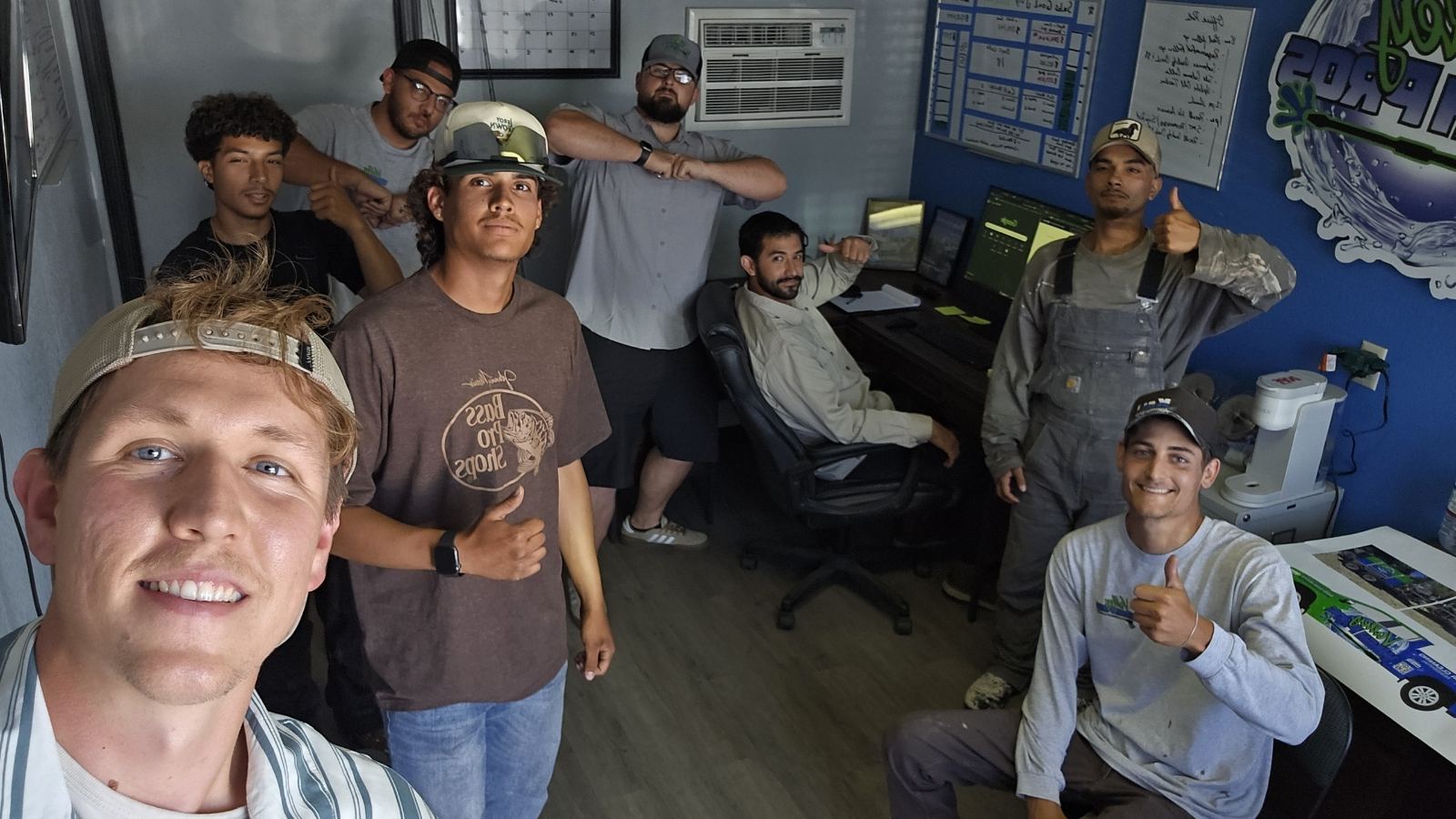 The Valley Wash Pros field team together in the office